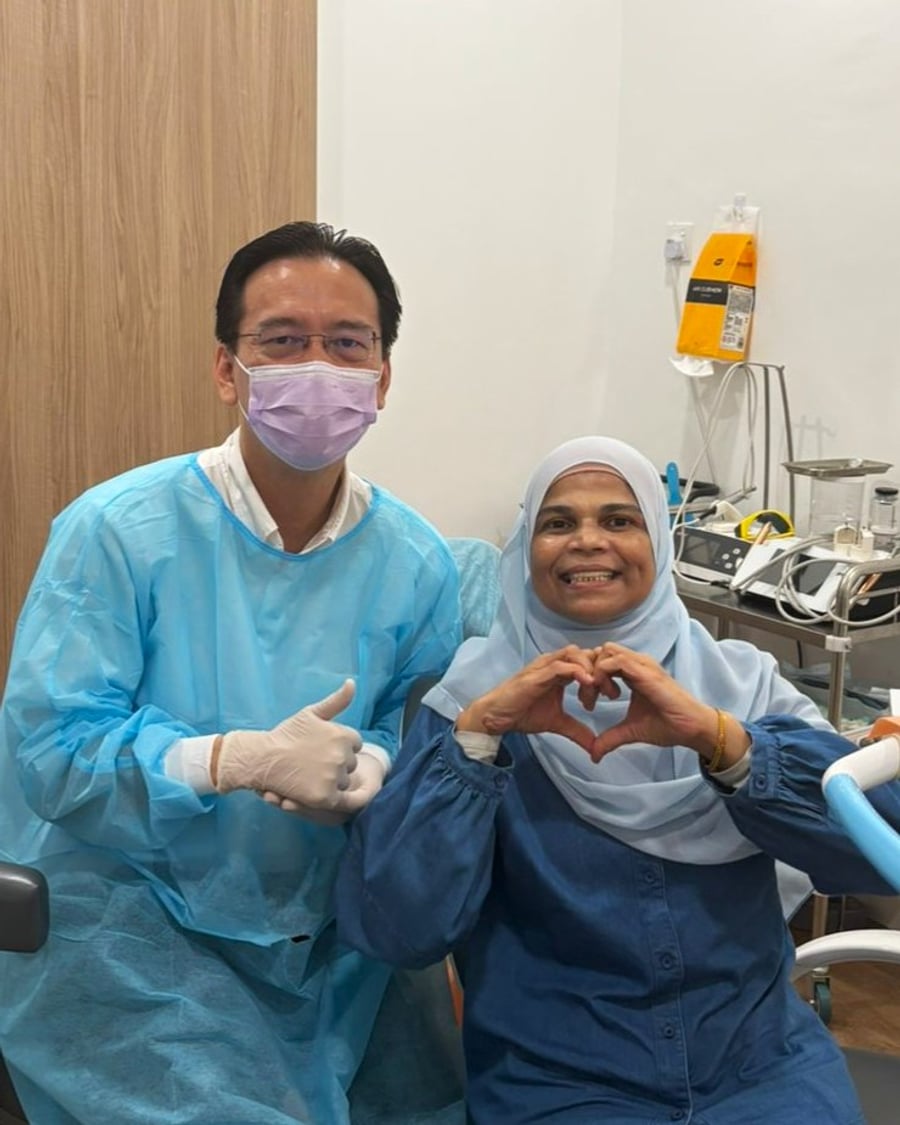 A happy patient with Dr. Chan at Ooi Dan Rakan